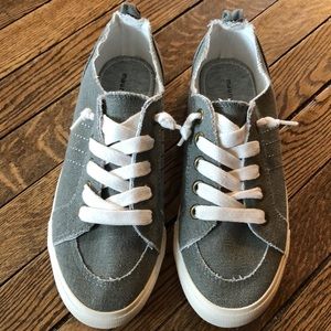 Maurice’s casual slip on frayed edge tie up shoes. Worn once excellent condition